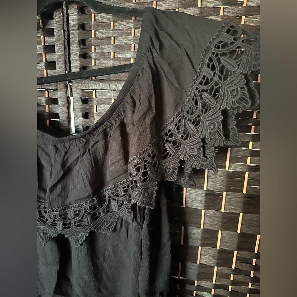 Black off the shoulder top with ruffle detail